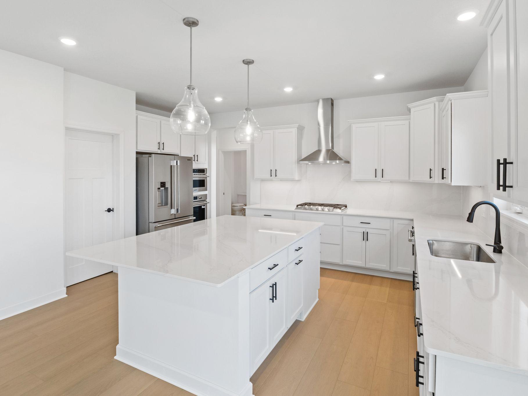(All the following photos are of a similar home, actual finishes may vary.)