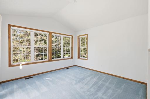 Sunroom has vaults and great west and south windows with views of pond.