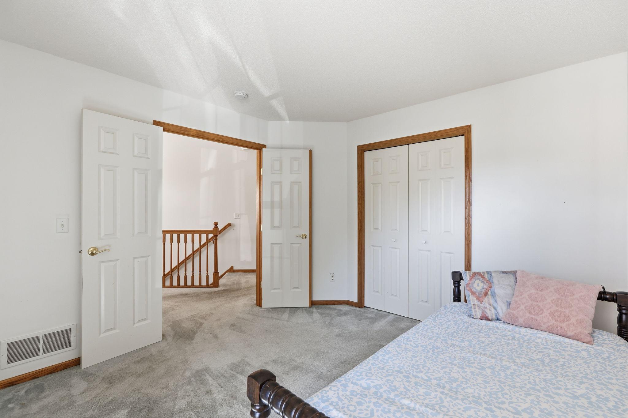 French doors into main floor bedroom.