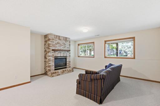 Lower level family room with gas fireplace.