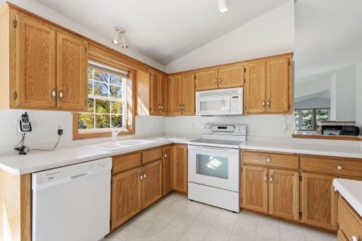 Great amount of countertops in the vaulted kitchen.