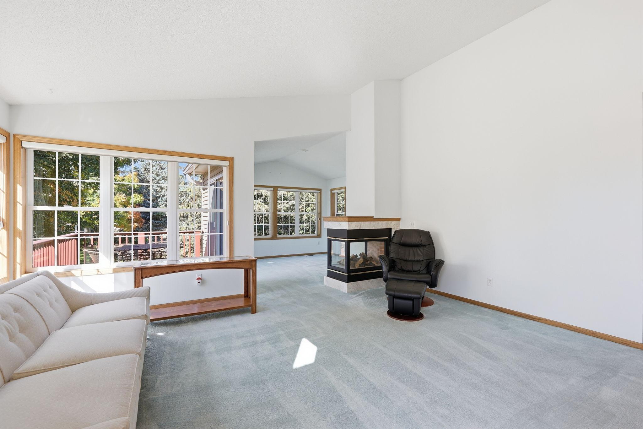 Such great windows and 3 way gas fireplace adds a nice warmth to the room.