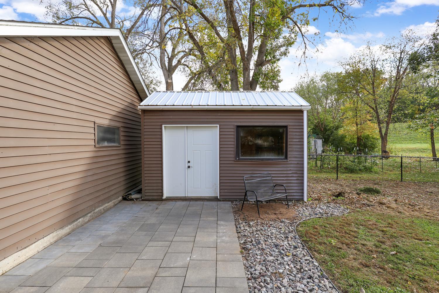 In addition to the fully finished garage, this 15' x 8' shed affords extra storage space.
