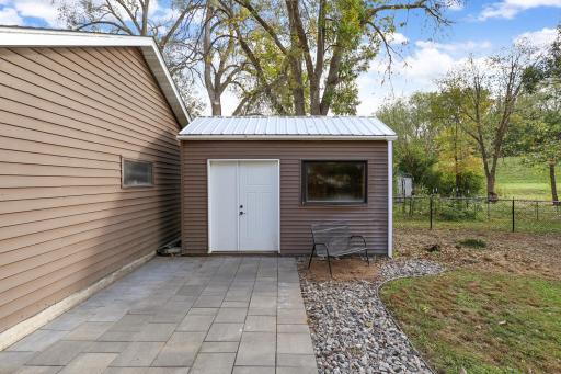 In addition to the fully finished garage, this 15' x 8' shed affords extra storage space.