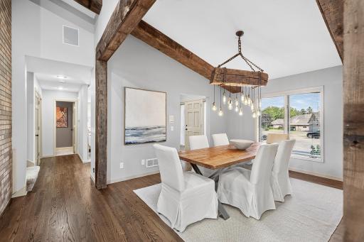 Natural light, vaulted ceilings and hardwood floors create an open and inviting feel.