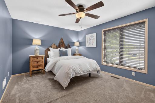 Second upper level cozy bedroom with nice closet space.