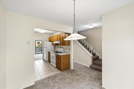 Head upstairs to the two bedrooms and full bath.
