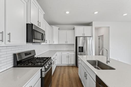 (Photo of a similar home, actual finishes may vary)