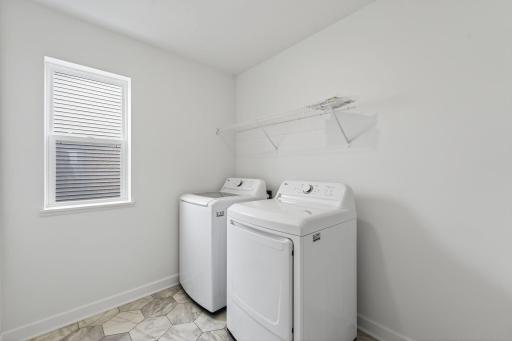 (Photo of a similar home, actual finishes may vary)