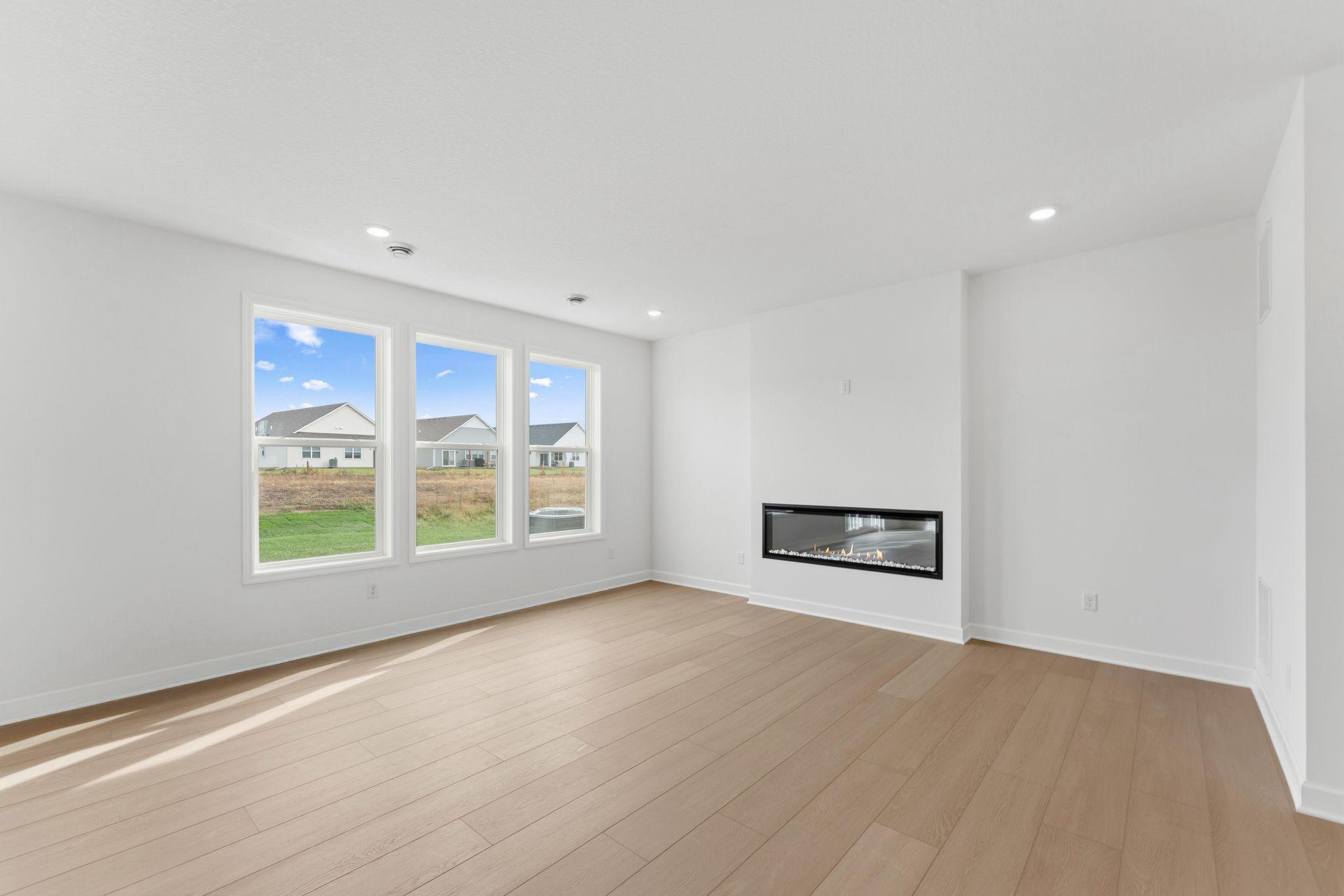 Energy-efficient windows fill the home with soft natural light on sunny days