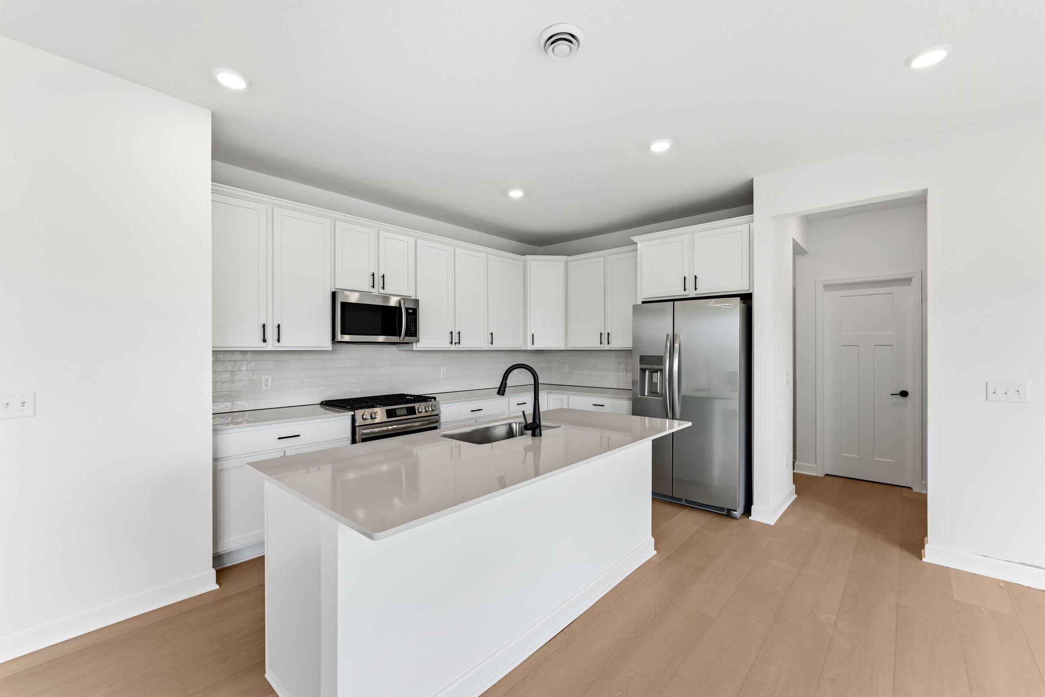 Enjoy casual meals and seating at the breakfast bar extension