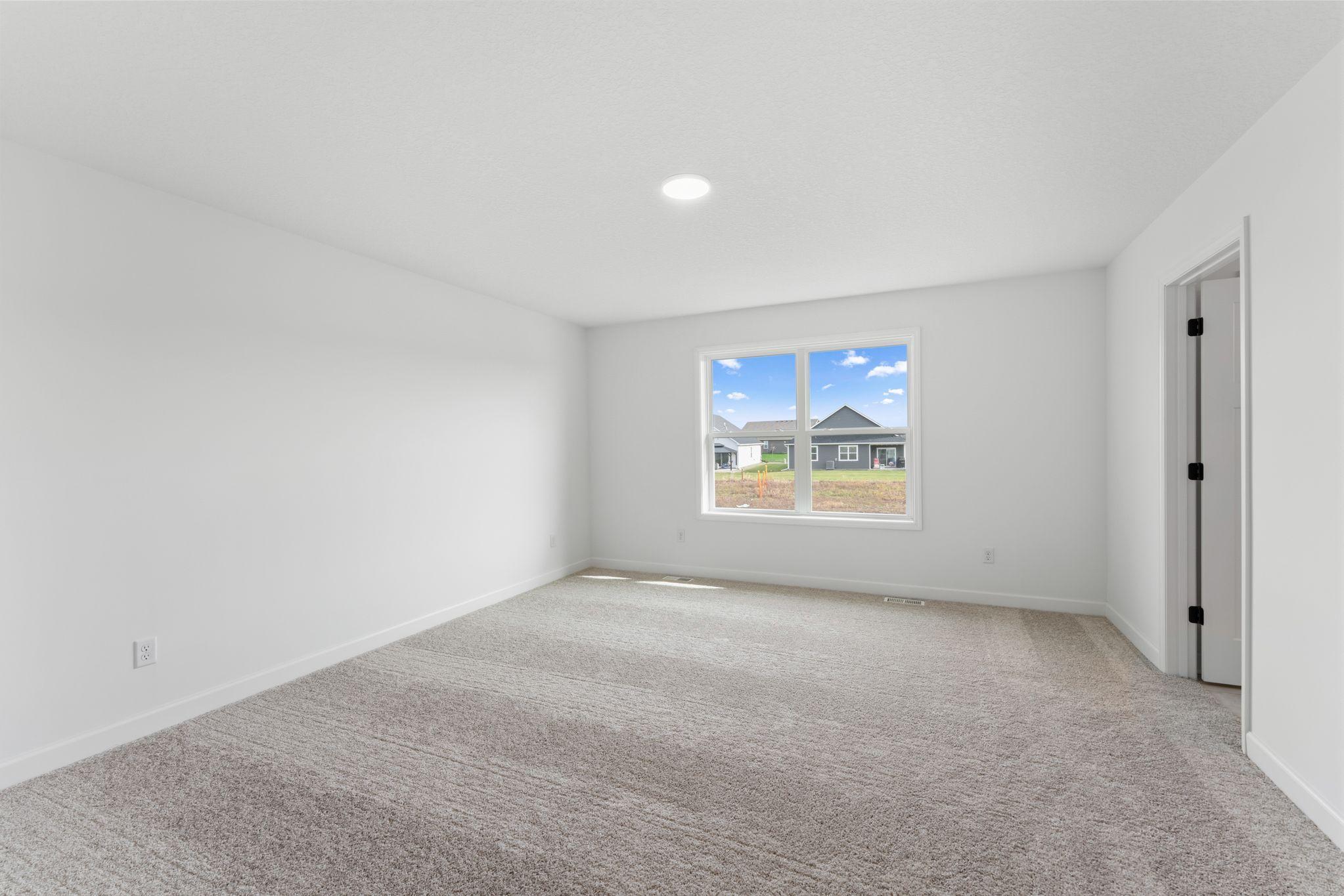 Complete with a large bedroom, spa-inspired bathroom and walk-in closet, the luxurious owner’s suite is tucked away on the second level.