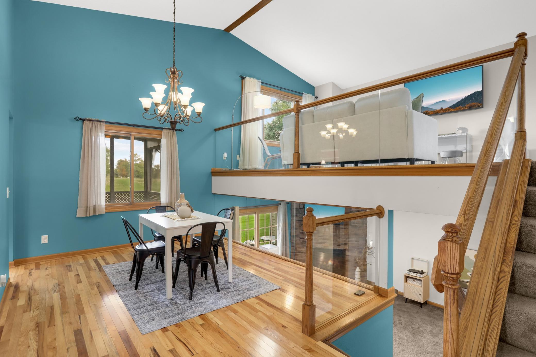 Dining area with vaulted ceiling