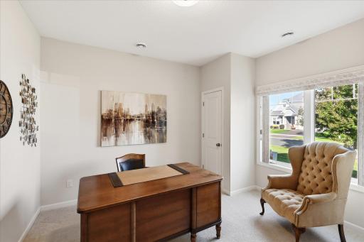 This versatile main level bedroom also makes a great office/den offering the perfect space for working from home, a cozy reading retreat, or quiet place to relax and unwind!