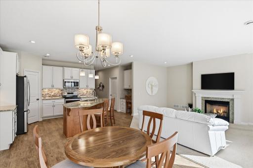 Inviting dining area conveniently located just off the kitchen, creating an effortless flow for everyday meals and entertaining!