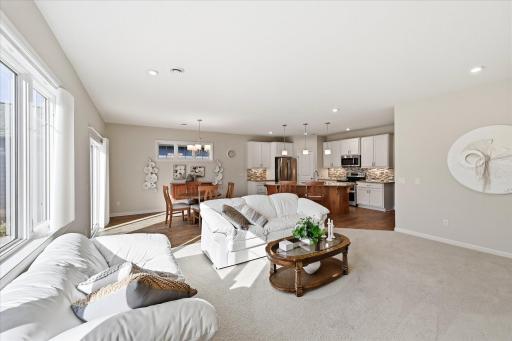 Enjoy the seamless flow of this open-concept floor plan, connecting the kitchen, dining, and living areas!