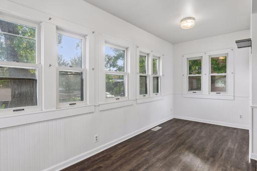Eating area - Breakfast nook - Dining space with windows on each wall overlooks the back and side yards.