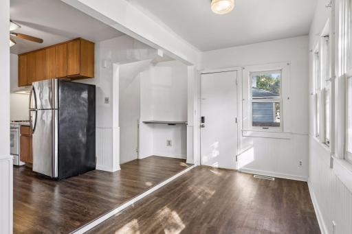 Desk area and doors leading to the backyard and lower level.