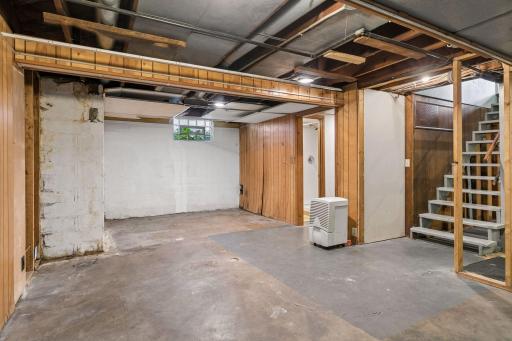 Lower Level Unfinished space - Ample room for storage & more!