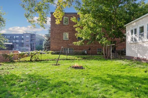 Backyard - lots of green space for entertaining and gardening.