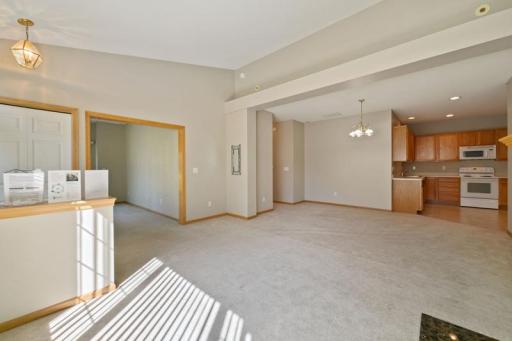 The living room and dining room can be arranged however you please and still be separate spaces.