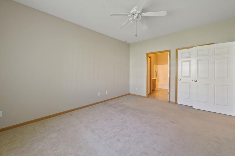 The primary bedroom has a connecting private bath and a walk-in closet.