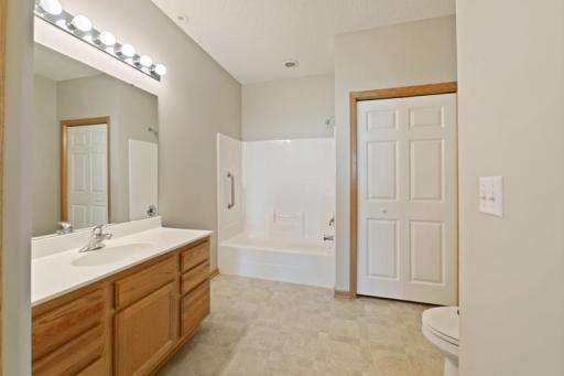 Primary bath is huge with 2 large linen closets as well.
