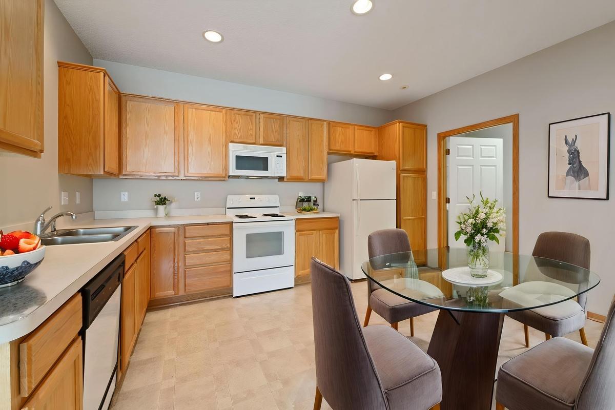 The kitchen has lots of cabinet and counter space. Plus, there is easily room for an island or an eat-in kitchen table in the corner. (Photo virtually staged)