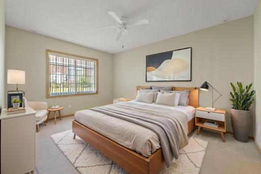 The primary bedroom is near the back of the townhouse, away from the road. (Photo virtually staged)