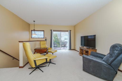 The main floor family room opens to the deck.