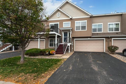 SOUTH-FACING SUNLIGHT and a 3-CAR GARAGE are delightful surprises in this 2BR + DEN townhome conveniently located in Trout Run Preserve.