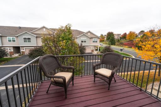 Neat and tidy deck with black railings and pretty views!