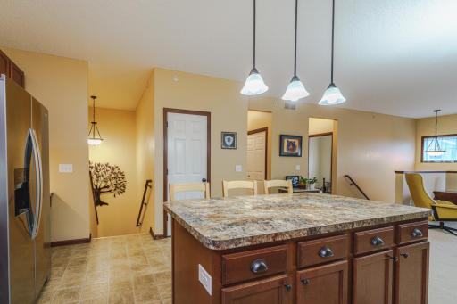 There is a pantry in the kitchen as well, located between the staircase and the hall.