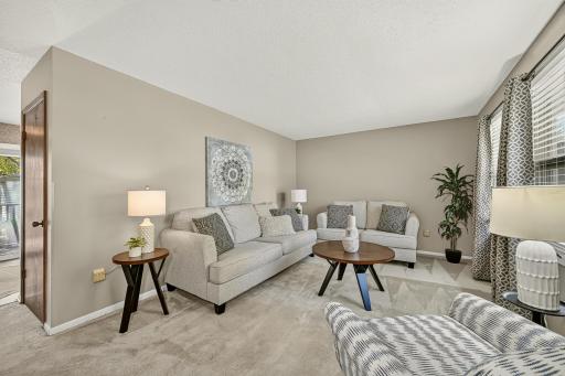 Newer carpeting with plush padding adds an extra layer of comfort underfoot.