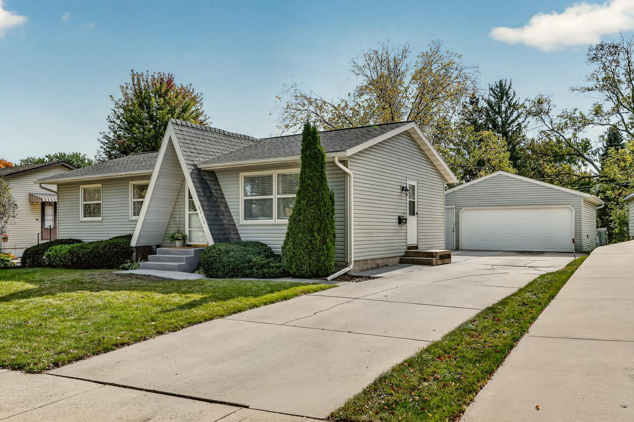 Standout curb appeal with a distinctive A-frame entry that adds architectural character and charm.