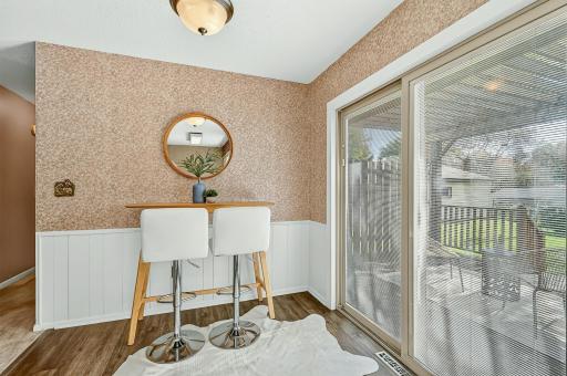 Bright and sunny eat-in kitchen offers plenty of flexibility, with room for a larger table and additional seating, or space for a stylish coffee bar, buffet/hutch or additional storage.