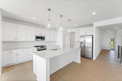 (All the following photos are of a similar home, actual finishes may vary.)