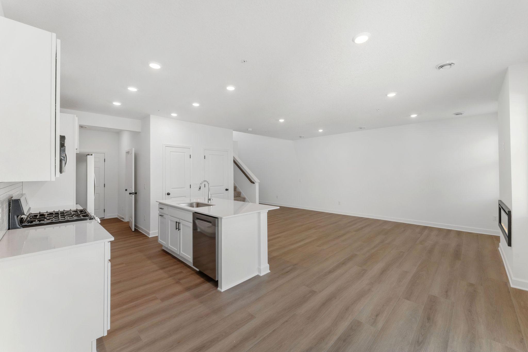 This center island includes a stainless steel sink with designer faucet to remove stubborn stains
