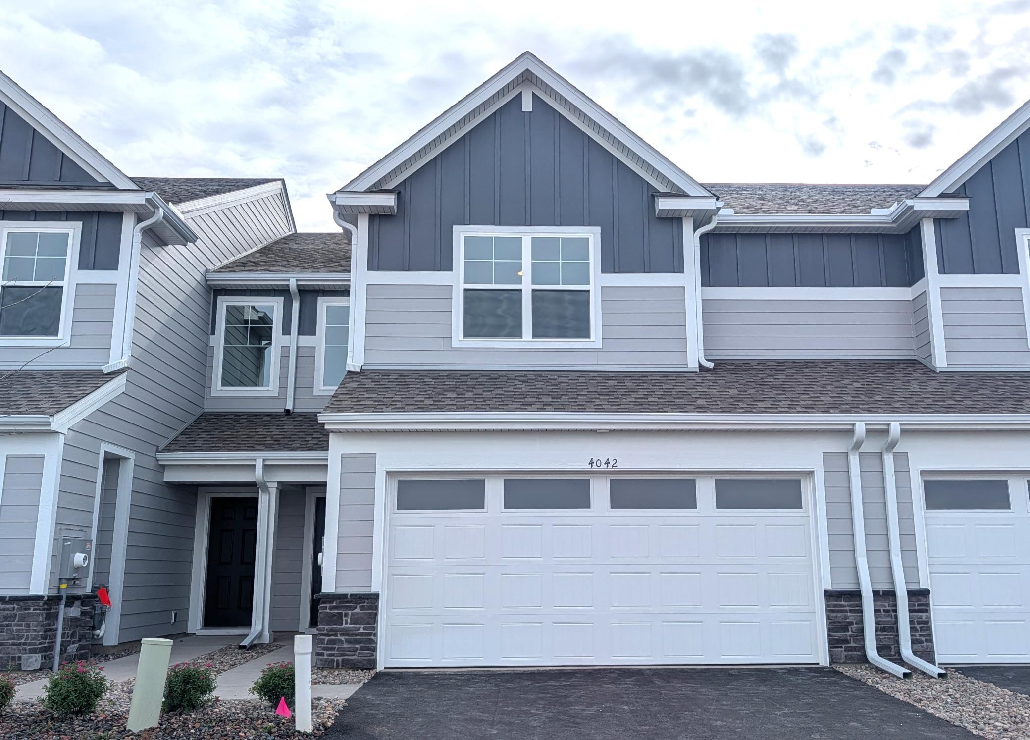 Welcome to 4042 Hayward Ave N! (Photo is of the actual home.)