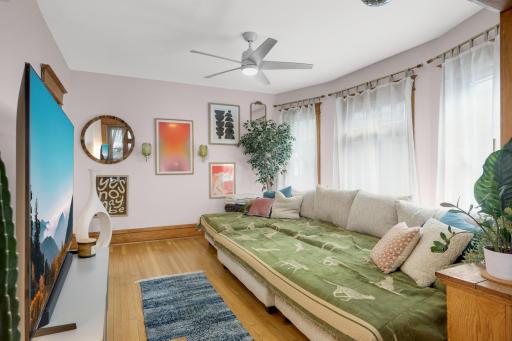 The living room and dining room are spacious and can accommodate a large sectional sofa.