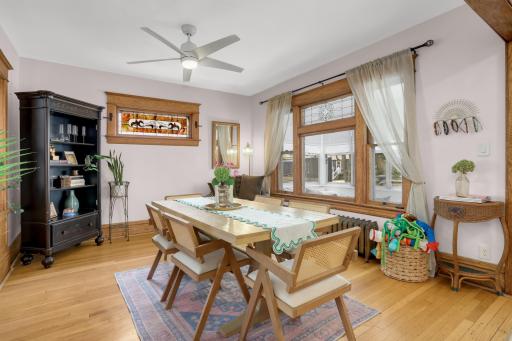 The leaded glass windows and 9.5-inch baseboards are a beautiful vintage touch.