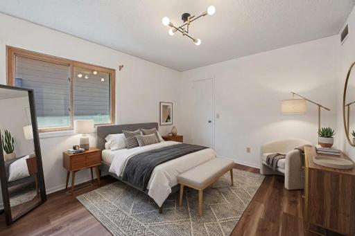 Virtually staged bedroom with 7X5 walk in closet.
