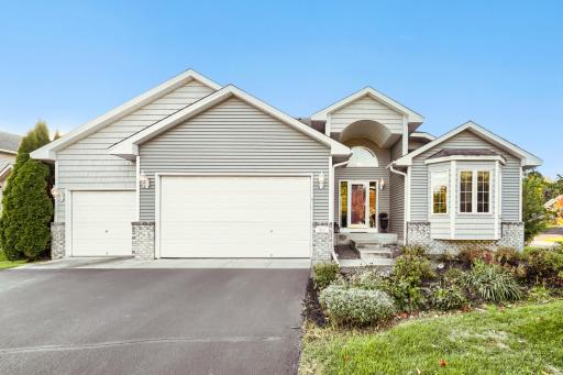 Welcome home to this beautiful Andover property! From the moment you arrive, you'll appreciate the impressive curb appeal, attractive combination of siding and brick accents, and beautifully landscaped front yard plus a spacious three-car garage