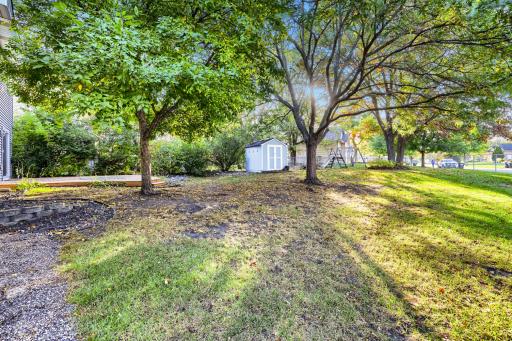 The large deck is perfect for entertaining, while the convenient storage shed provides extra space for lawn equipment, gardening tools, and seasonal items. A wonderful outdoor retreat with room to enjoy!