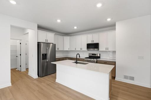 (All the following photos are of a similar home, actual finishes may vary.)