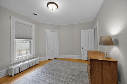 Bedroom four features hardwood floors and is conveniently located just steps from a Â¾ bath.