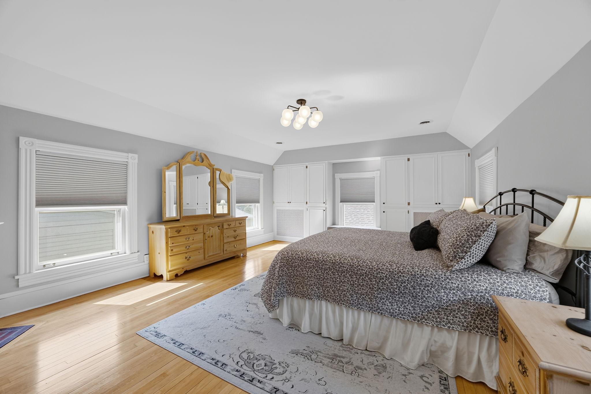Abundant windows fill the room with natural light.