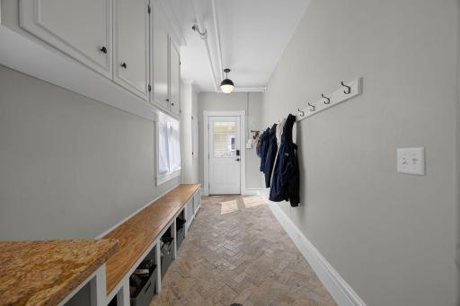 This space also offers convenient access to the backyard and detached 2-car garage.