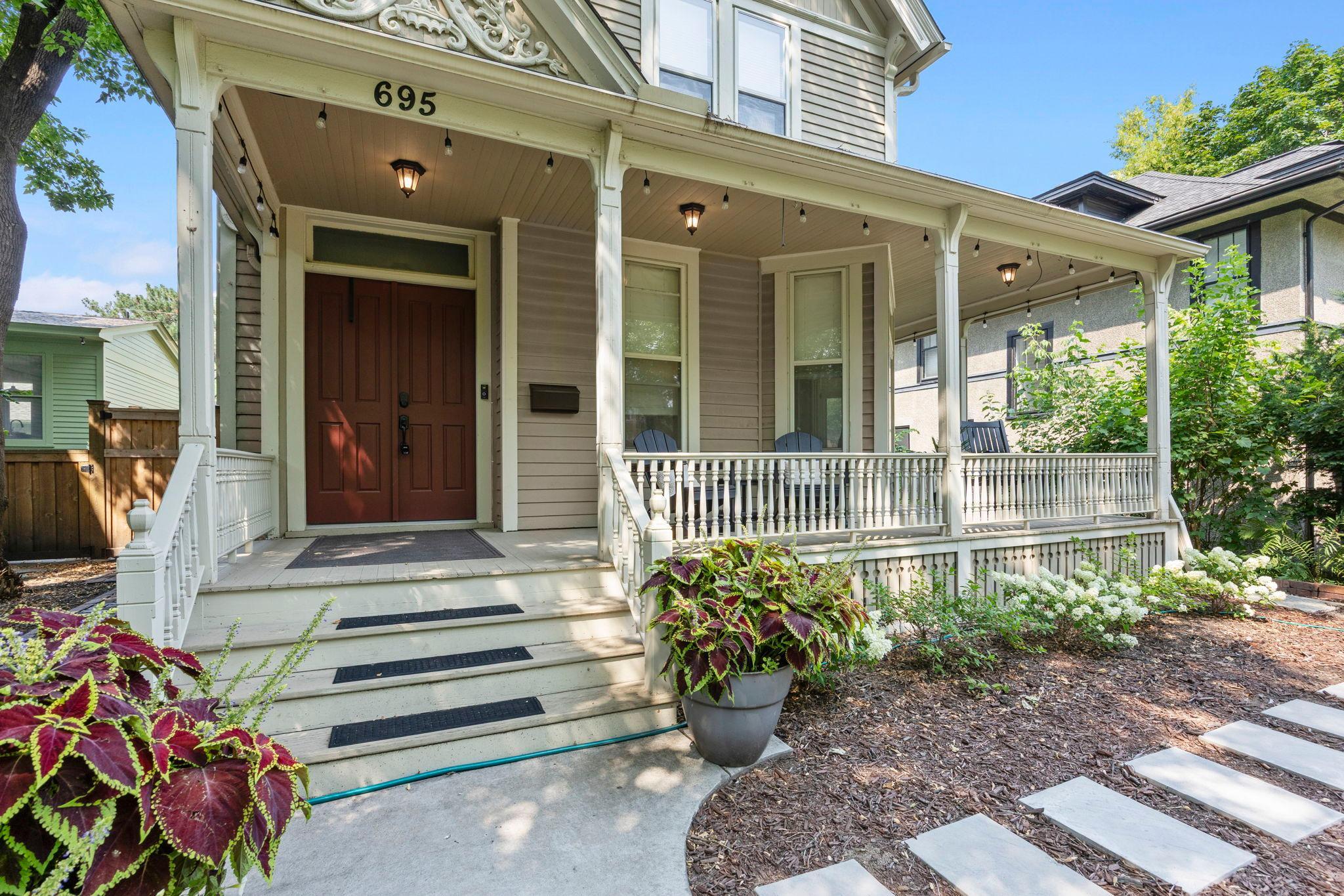 From the moment you arrive, the exceptional curb appeal sets the tone, with beautifully landscaped grounds, new terraced retaining walls, and colorful plants and flowers extending from front to back.