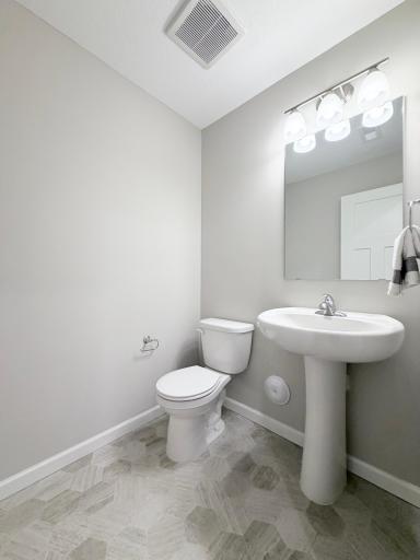 Tucked away powder bath on the main level.